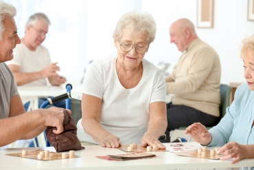 Senior people playing game at community center